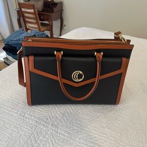 Elegant Black and Brown Handbag